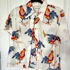 Anthropologie short sleeved buttoned shirt